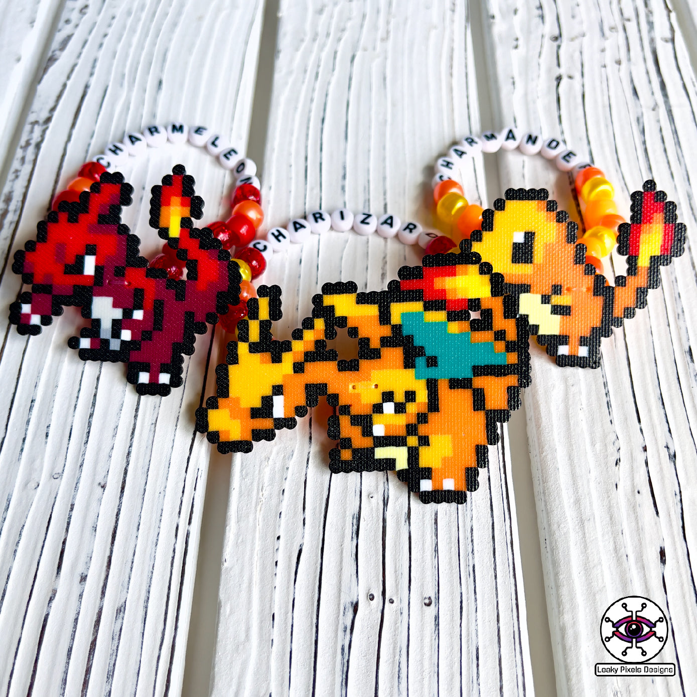 Charmander, Charmeleon and Charizard Pokemon perler bracelets by leaky pixels