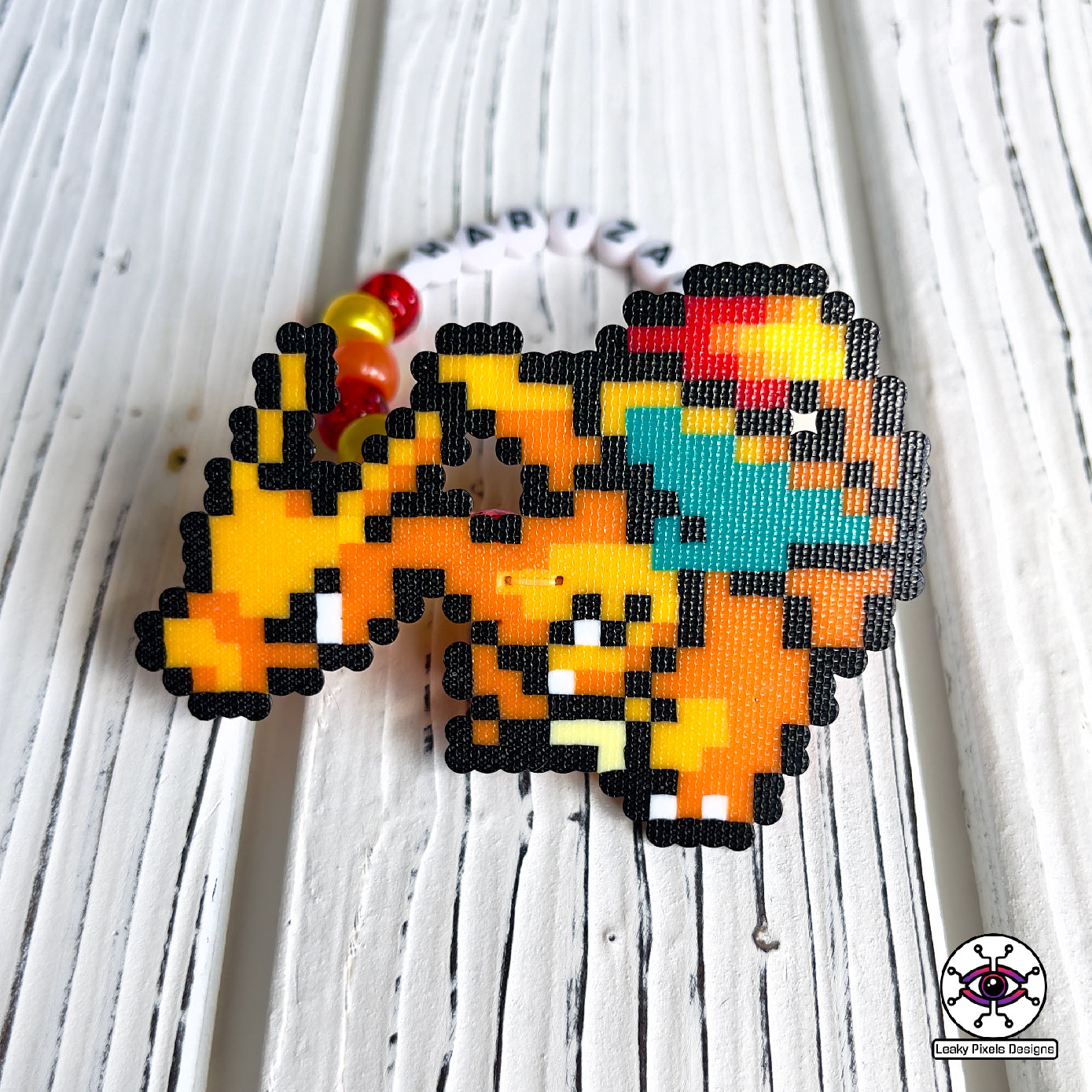 Charmander, Charmeleon and Charizard Pokemon perler bracelets by leaky pixels