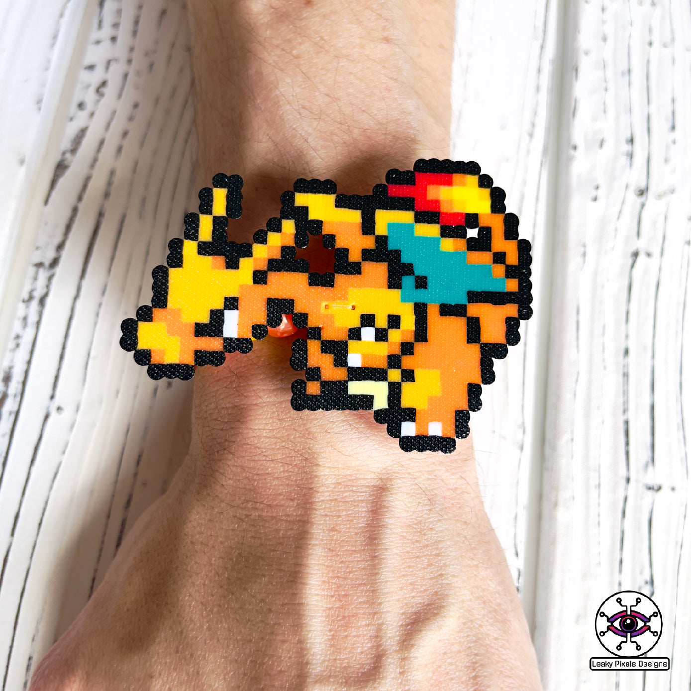 Charmander, Charmeleon and Charizard Pokemon perler bracelets by leaky pixels