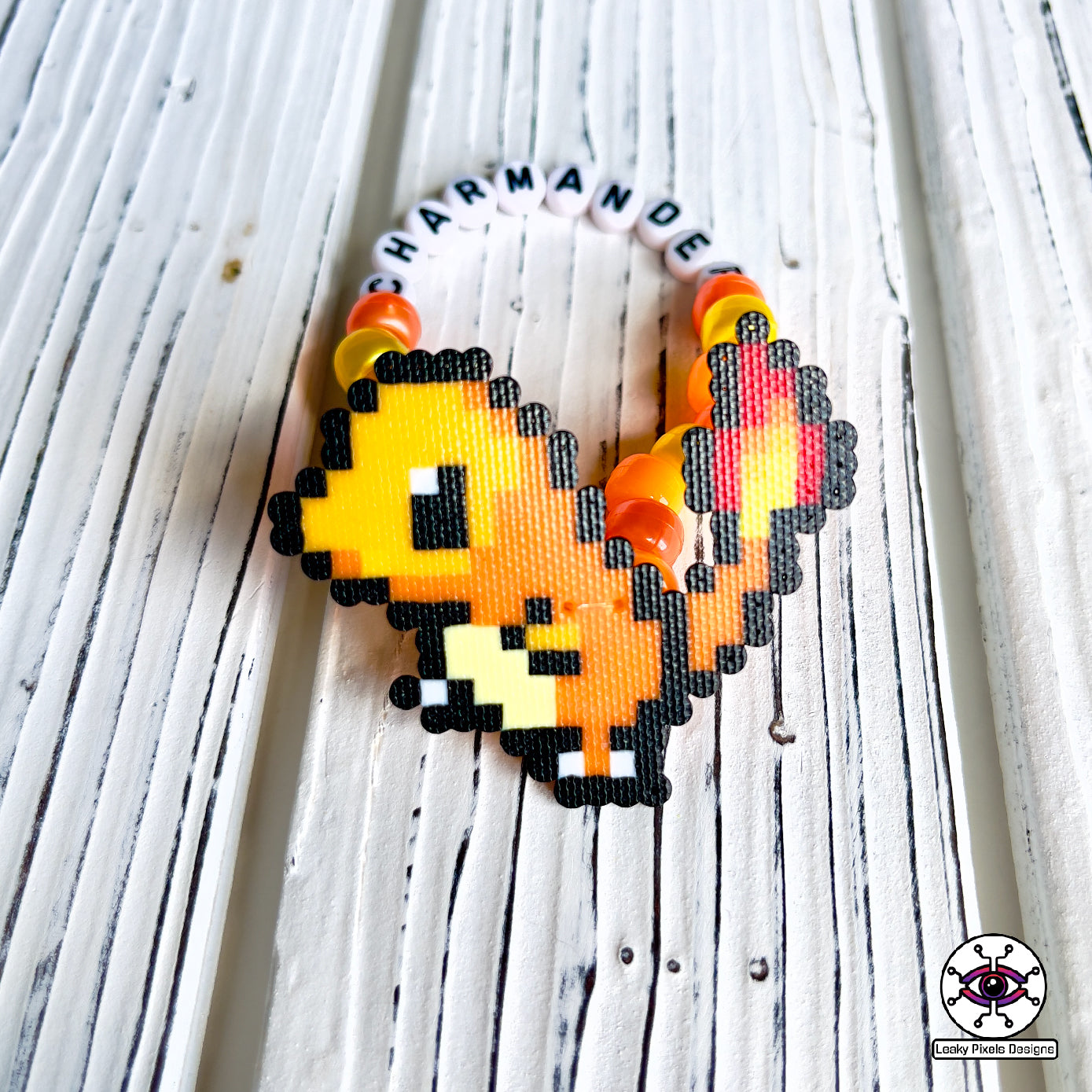 Charmander, Charmeleon and Charizard Pokemon perler bracelets by leaky pixels