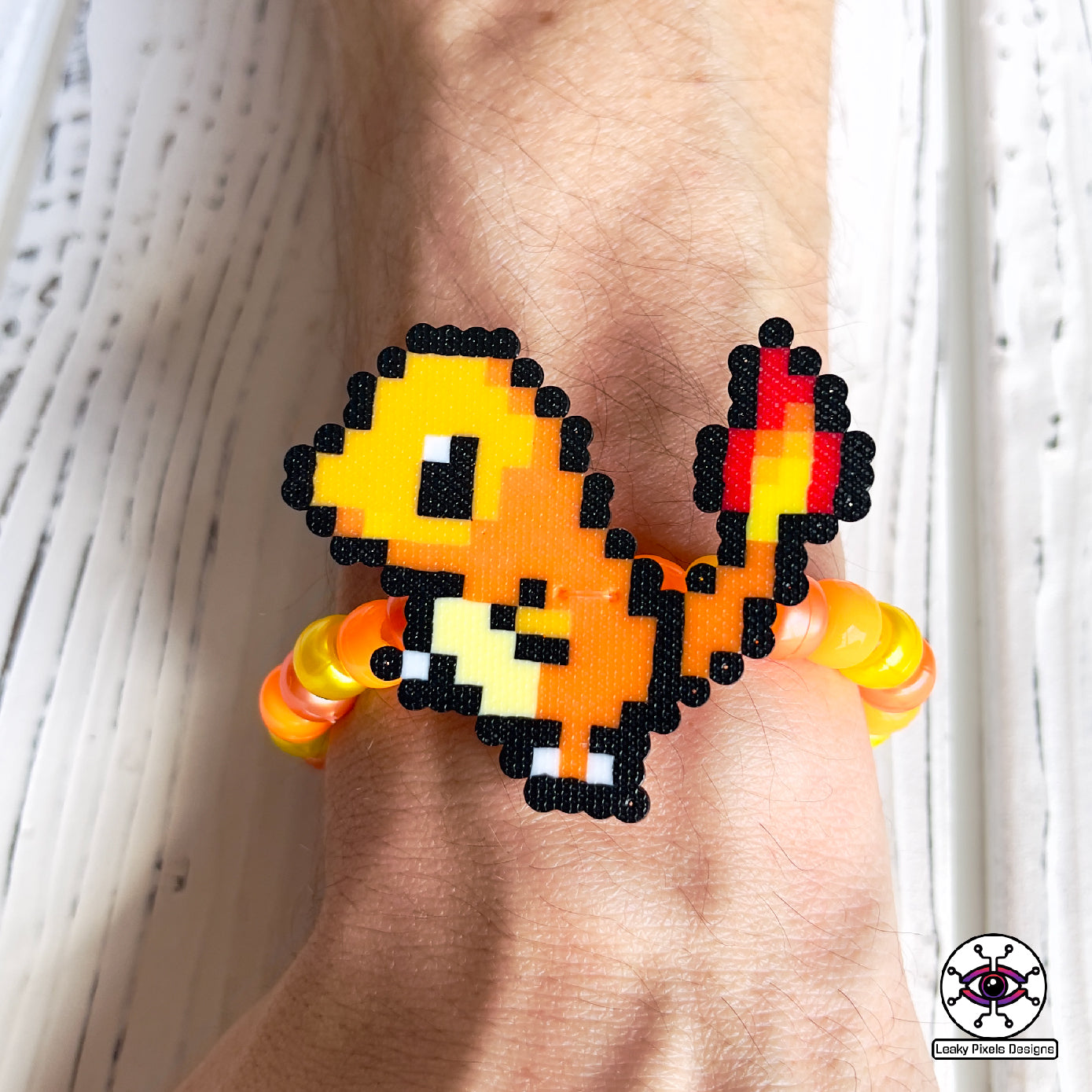 Charmander, Charmeleon and Charizard Pokemon perler bracelets by leaky pixels