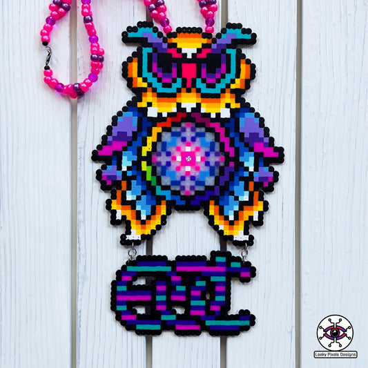 edc owl perler necklace. owl is different colors of the rainbow with the letters edc hanging from below