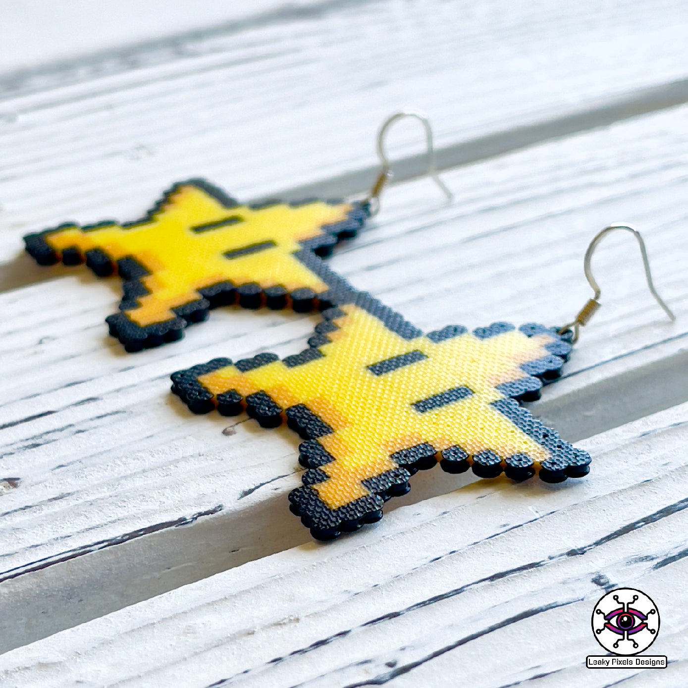 Rainbow super mario star perler earrings