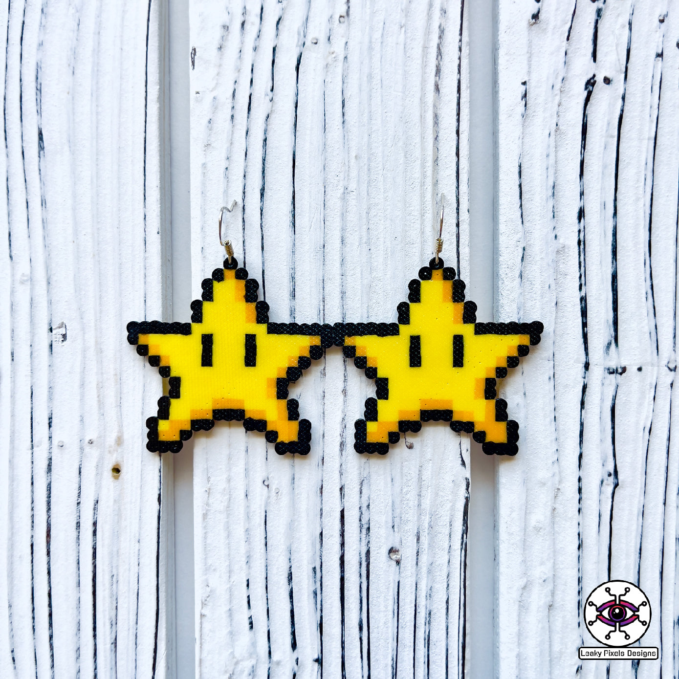 Rainbow super mario star perler earrings